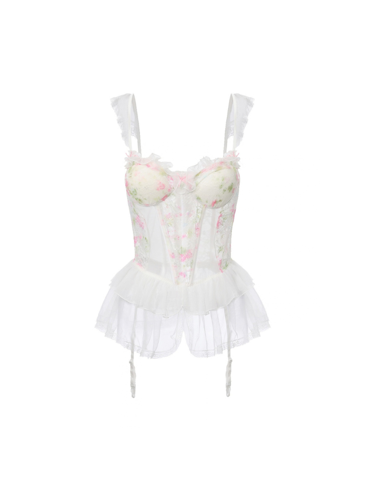 White floral lace teddy bodysuit showing ribbon straps and tiered mesh hip ruffles