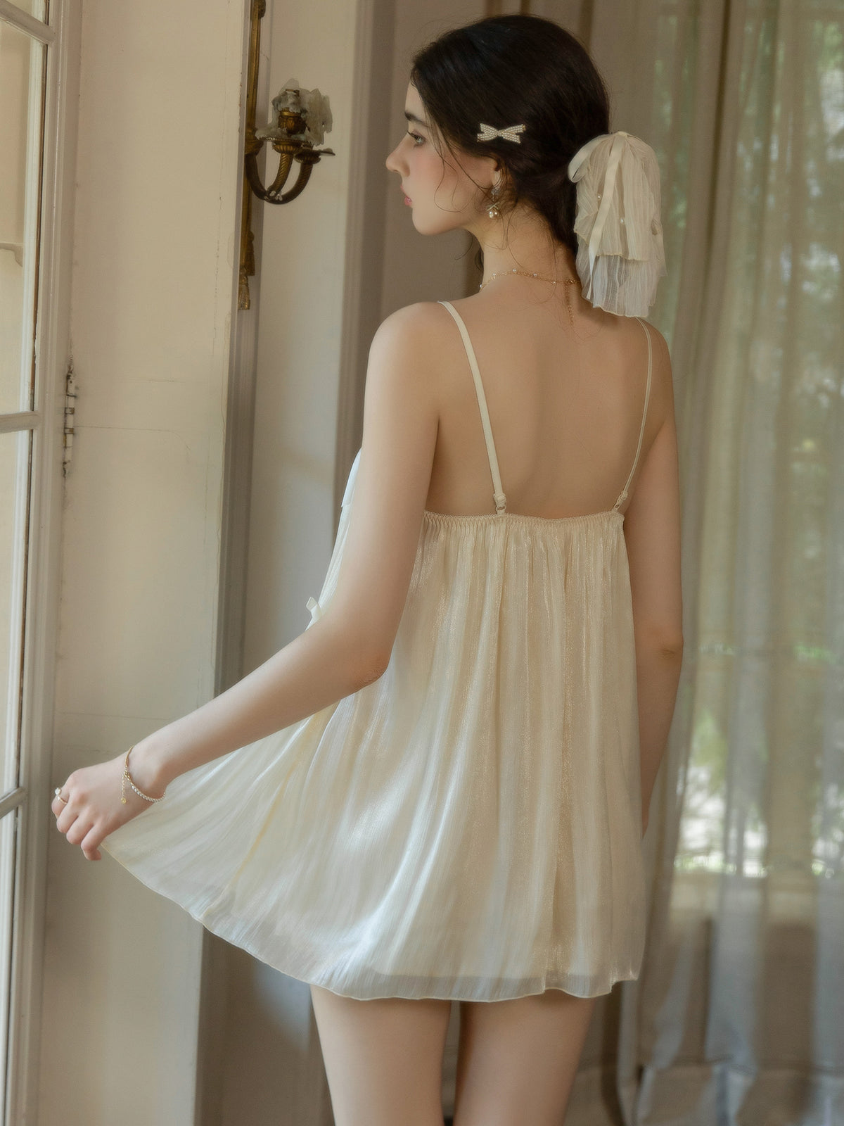 Back view of ivory gathered babydoll nightgown
