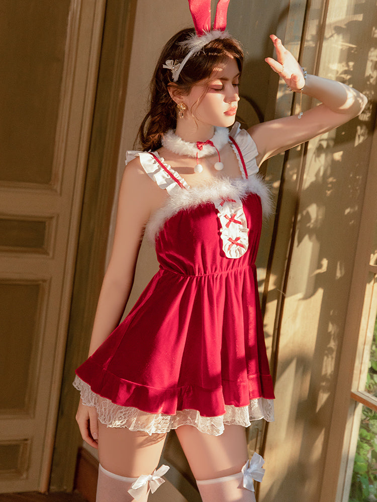 Woman in a Red Velvet Bunny Christmas Babydoll Lingerie Mini Dress with bunny ears standing indoors.