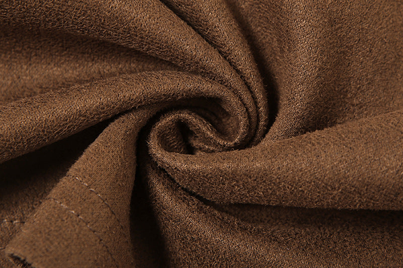 Close-up of brown fabric with a textured surface