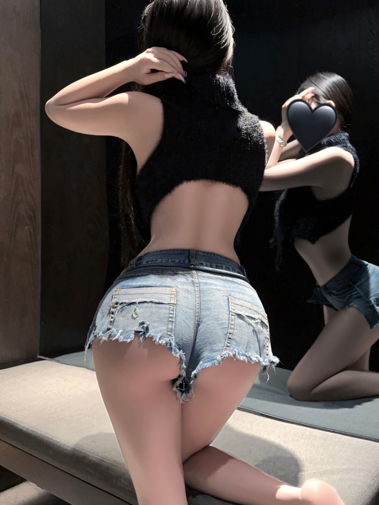 Keyhole Open Back Crop Sweater Frayed Shorts Black sweater open back and Blue shorts rear view
