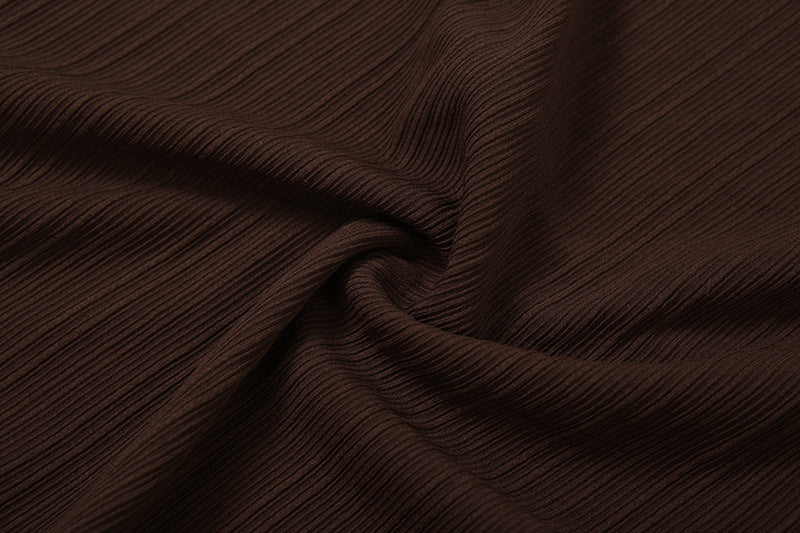 Close-up of brown pleated fabric texture