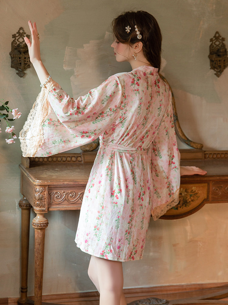 Woman wearing a Ditsy Floral Velvet Lace Trim Slip Dress Pink in a vintage room with wooden furniture.