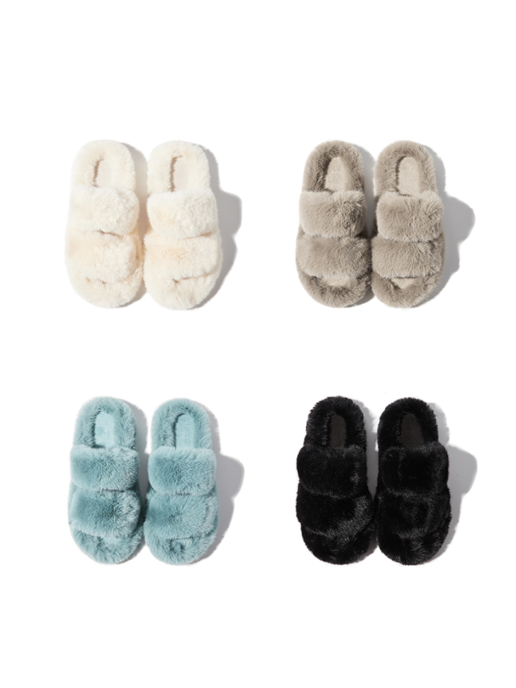 Fuzzy slippers multiple colors top view placed on white surface