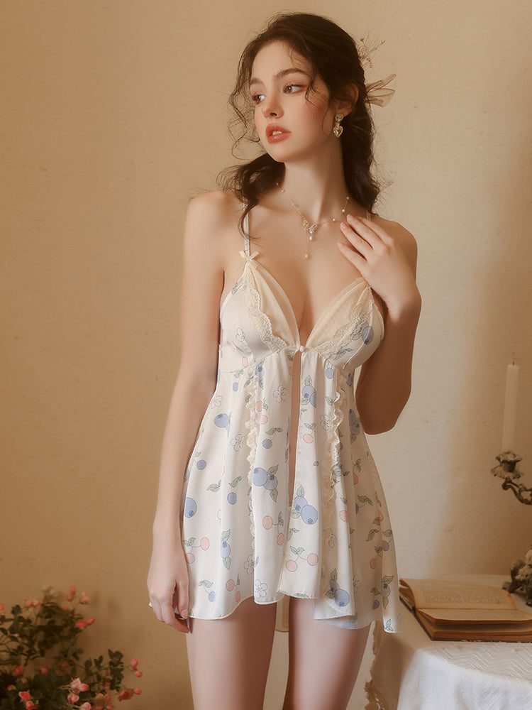 Woman wearing a floral nightgown against a warm-toned background