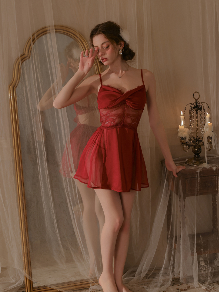 Front view standing pose lace panel backless satin mini slip dress red