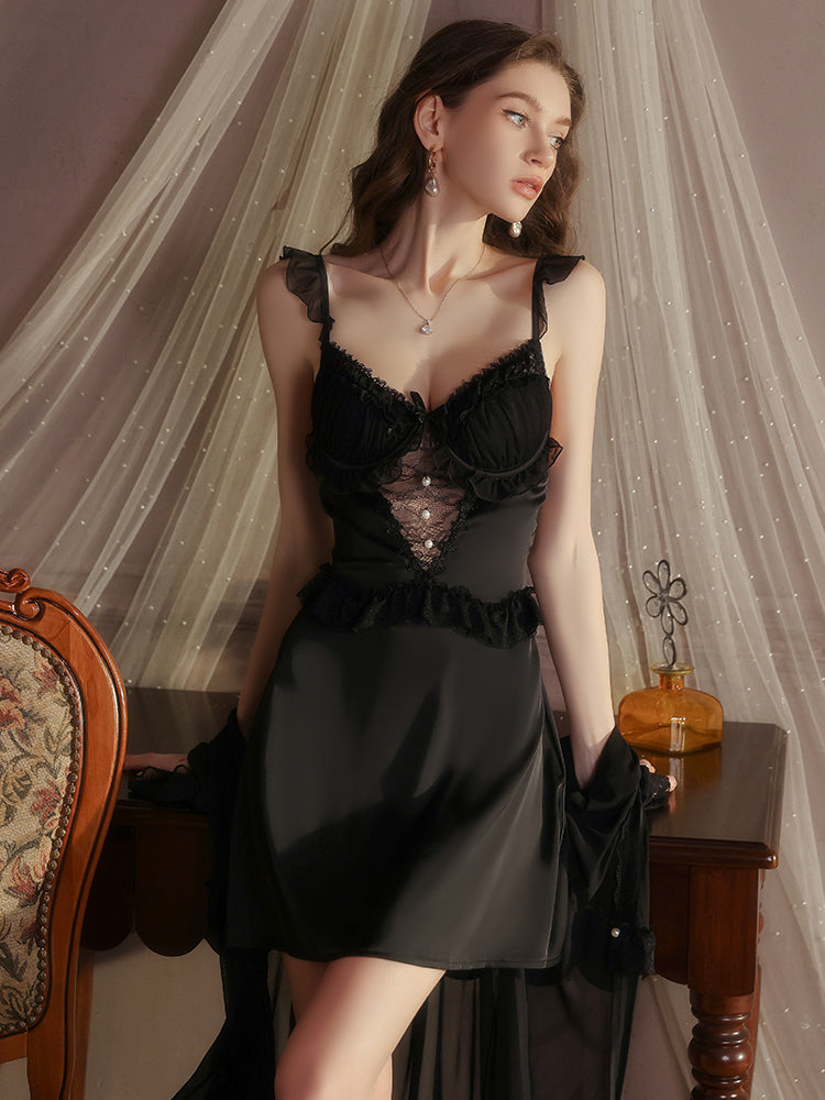 Woman in a black Lace Trim Sheer Long Robe & Satin Babydoll Nightgown standing in an elegant room with draped curtains.