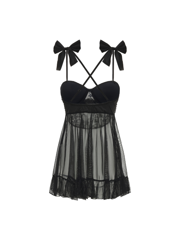 Black dress with bow straps on a white background