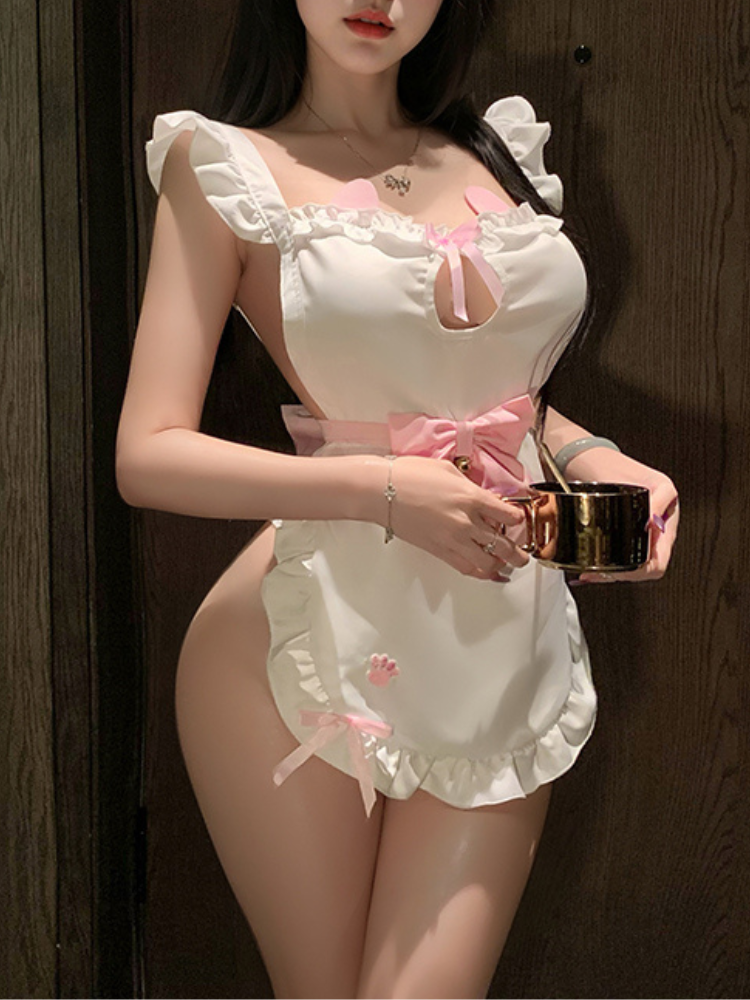 Person wearing a Sexy Maid Outfit White Pink Ruffle Maid Dress Costume Lingerie Set holding a small pot against a wooden background