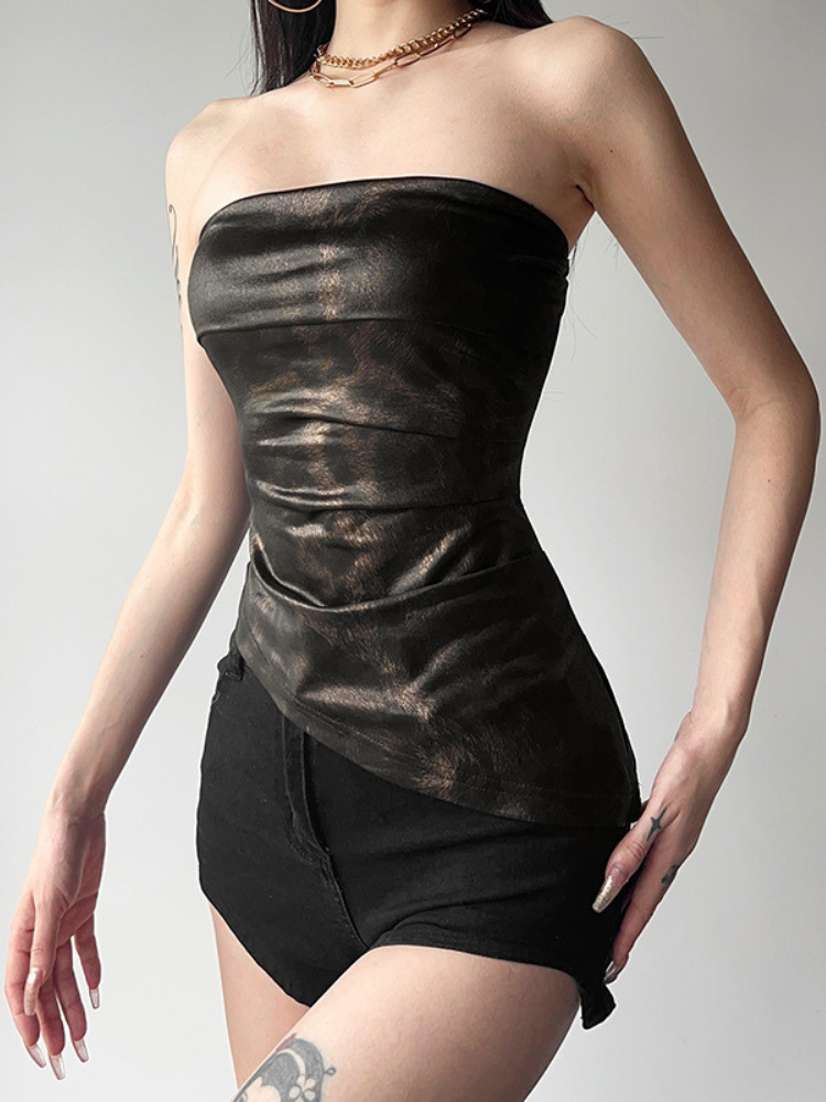 Black strapless top and shorts worn by a model on a plain background