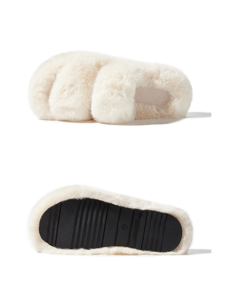 White fuzzy slippers side view placed on surface double strap design