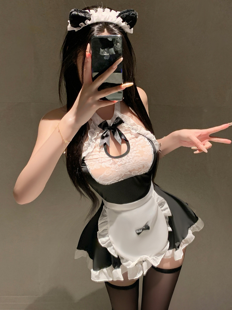 Person wearing a black and white Sexy French Maid Outfit Lace Halter Apron Mini Dress with a bow tie and apron.