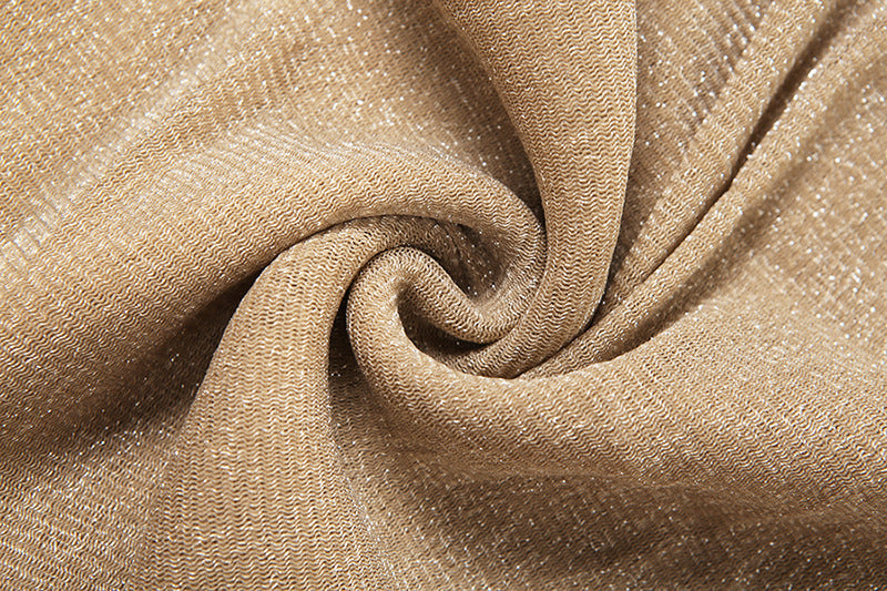 Close-up of beige fabric with a subtle texture