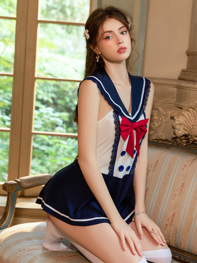 Woman wearing a Sailor Collar Bow Sailor Uniform Costume Navy Blue, sitting on a couch.