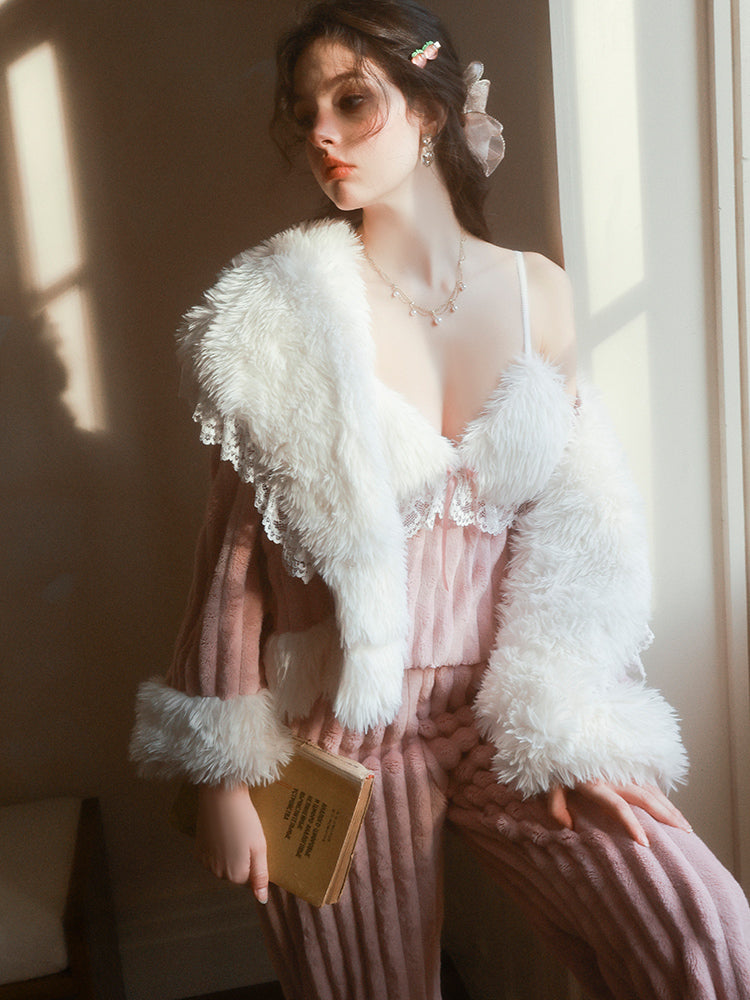Woman in a white fluffy Textured Knit Plush Pink Pajama Set holding a book in a softly lit room.