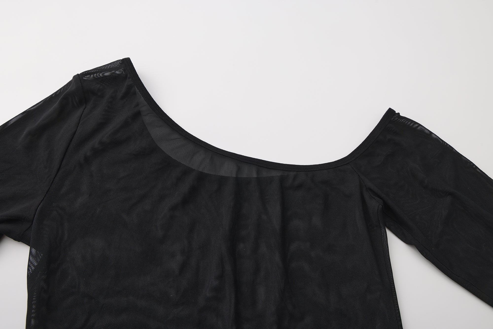 Black long-sleeve top on a white background