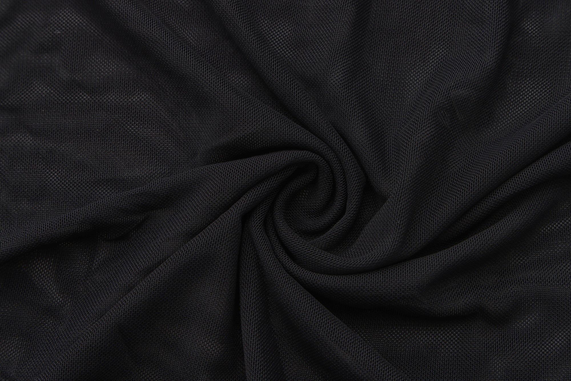 Close-up of black fabric with folds