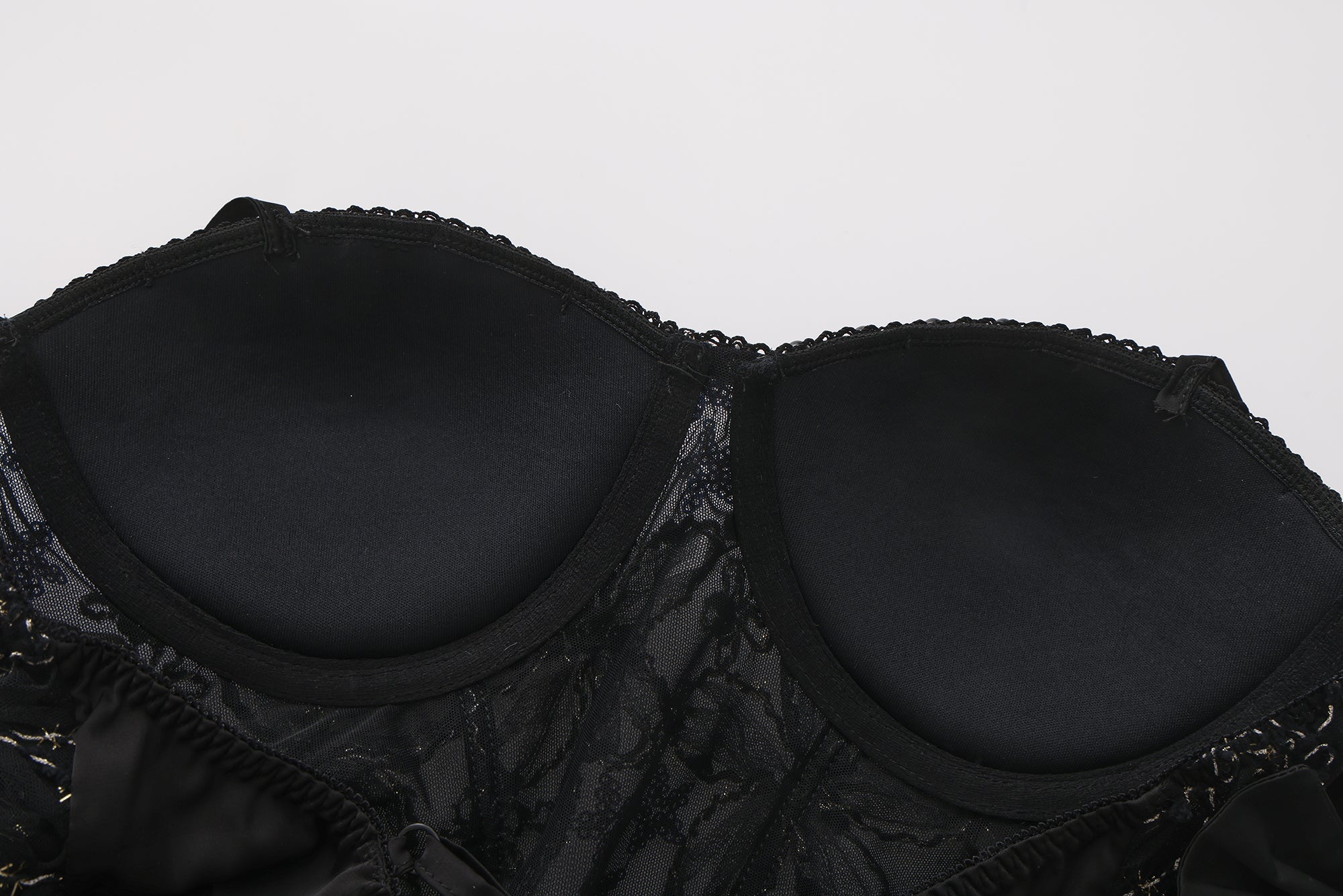 Black lace bra on a white background