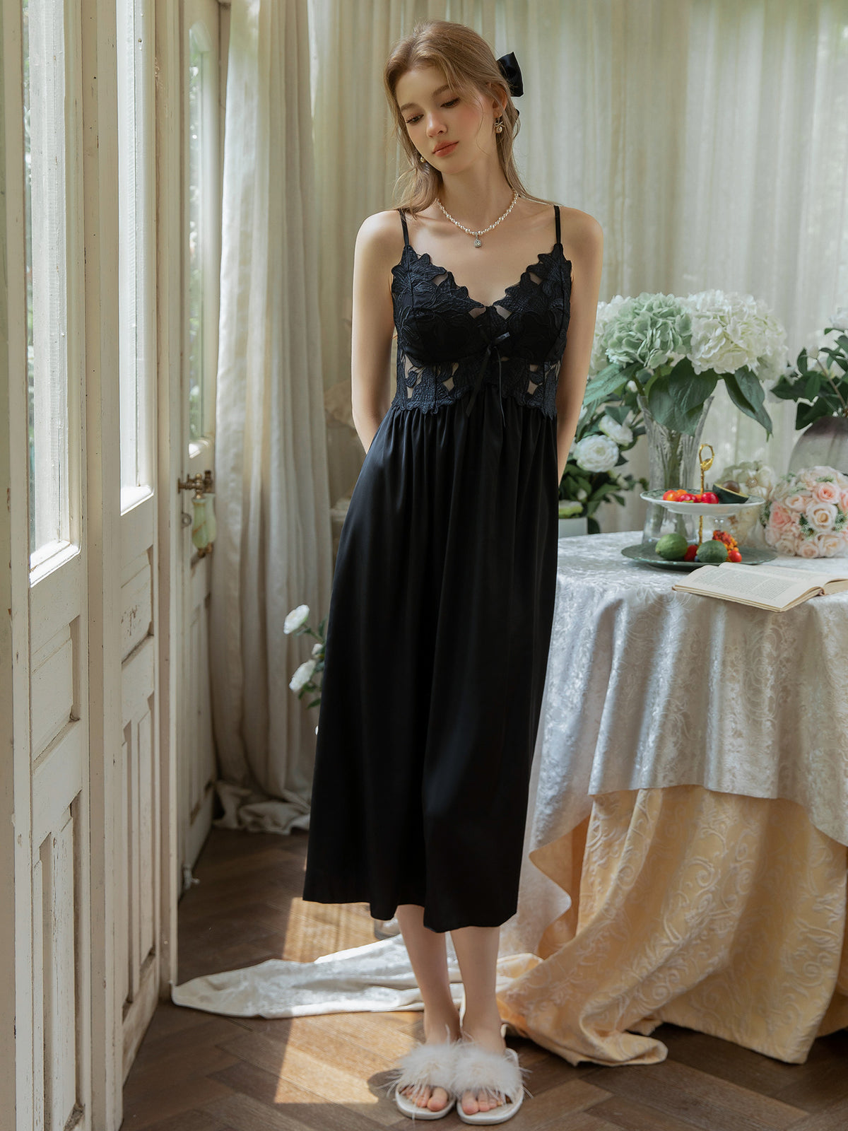 Black satin midi nightgown front view showing spaghetti straps and scalloped lace neckline