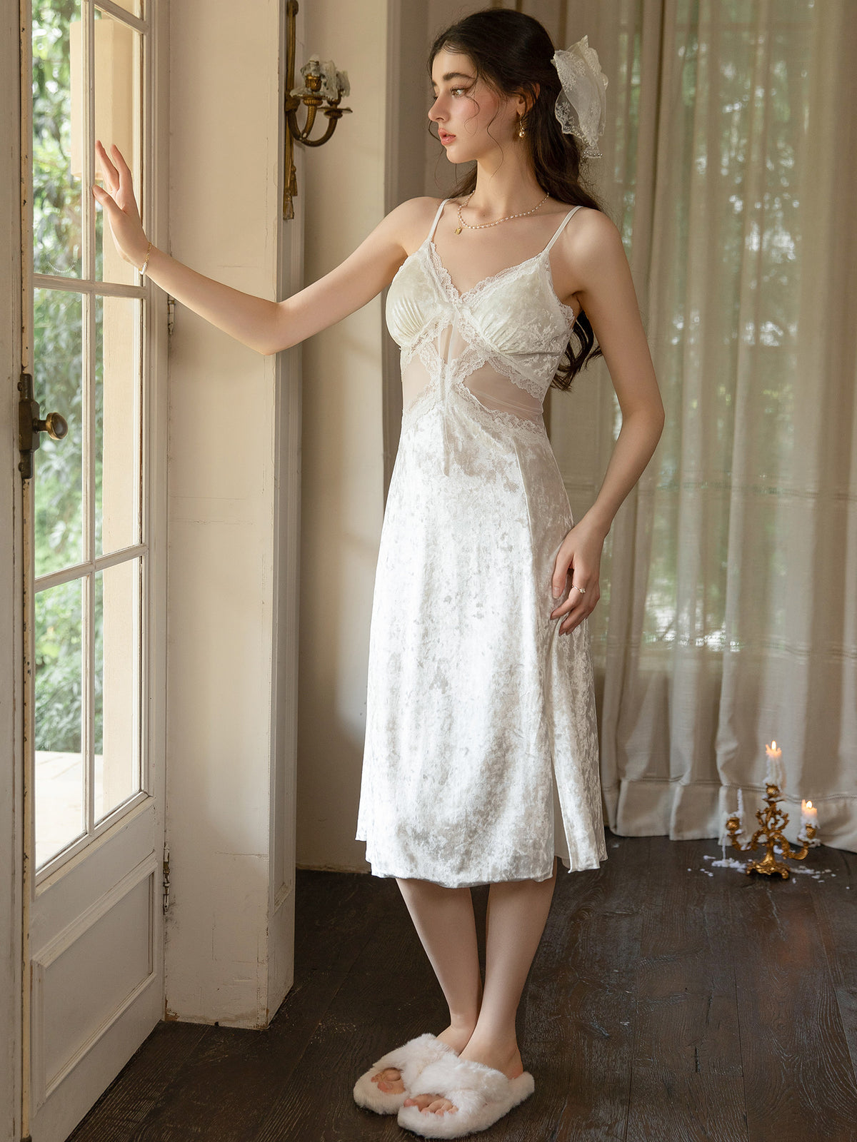 Ivory velvet midi slip dress front view showing sheer waist panels and ribbon ties