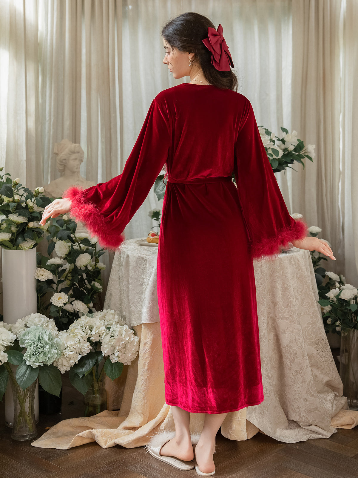 Red long sleeve velvet wrap robe rear view showing waist tie