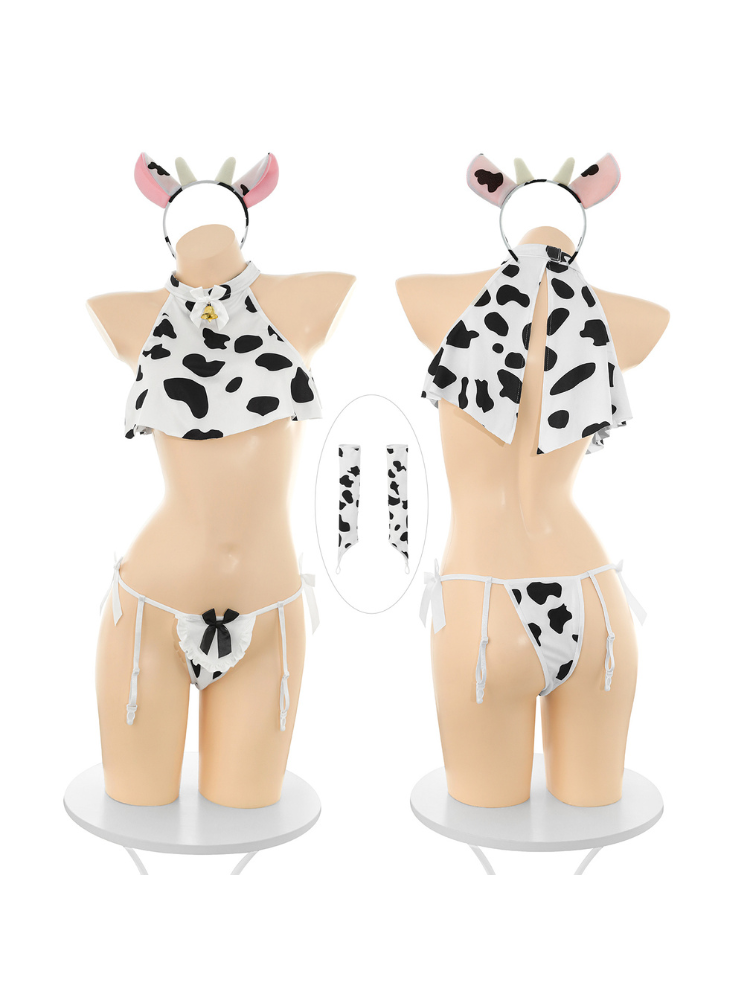 Black and white cow print halter crop top costume set front and rear mannequin views and arm sleeves
