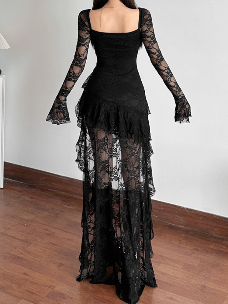 Black lace dress with long sleeves on a plain background
