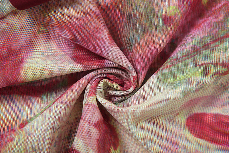 Close-up of a fabric with pink and yellow floral pattern