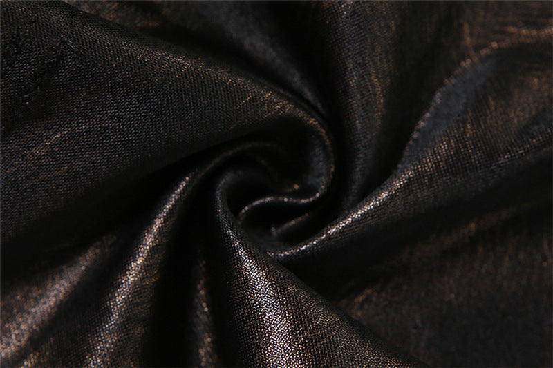 Close-up of dark fabric with a textured surface