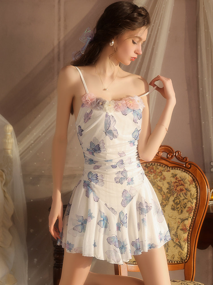 Woman wearing a floral nightgown in a softly lit room.