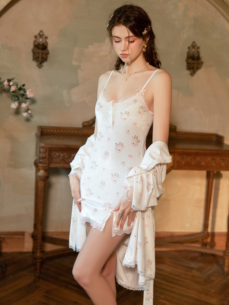 Woman in a white White Lace Trim Printed Slip Dress standing in an elegant room with wooden furniture and decorative elements.