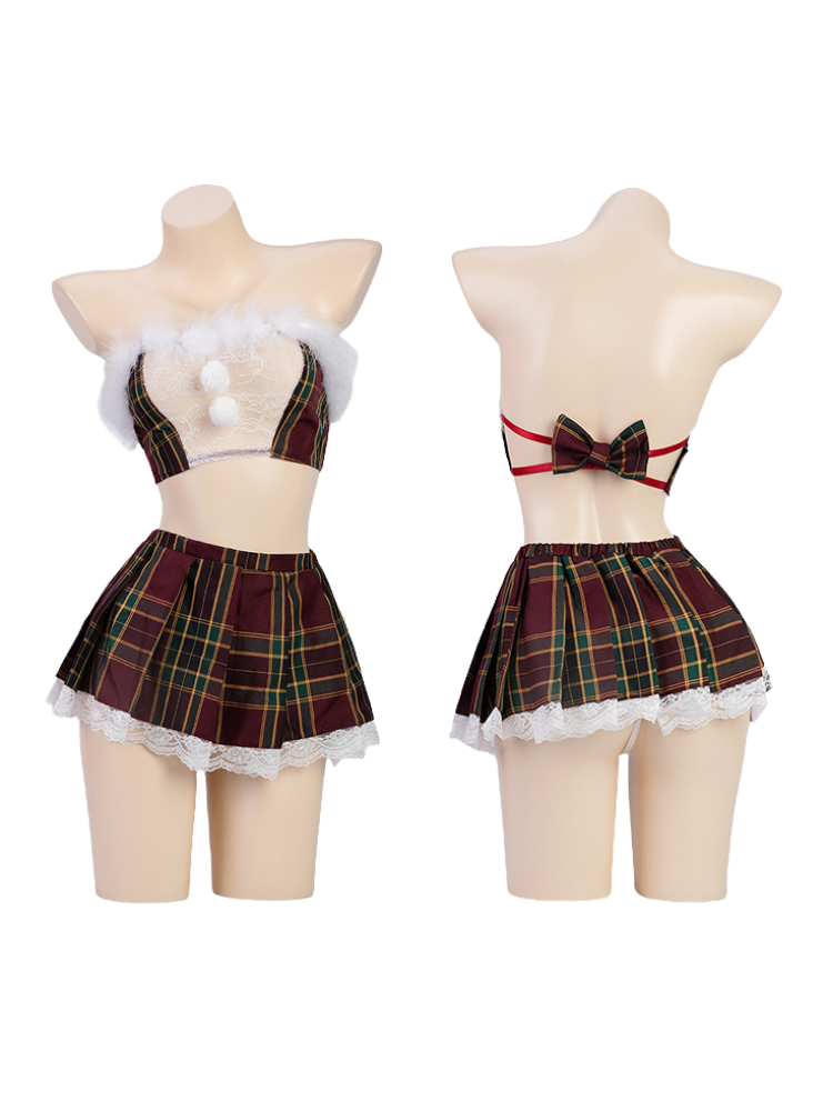 Two mannequins wearing plaid skirts with different top styles on a white background