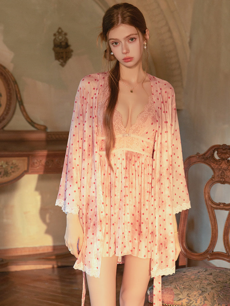Woman wearing a Pink Lace Babydoll Dress with robe in an elegant room with decorative elements.