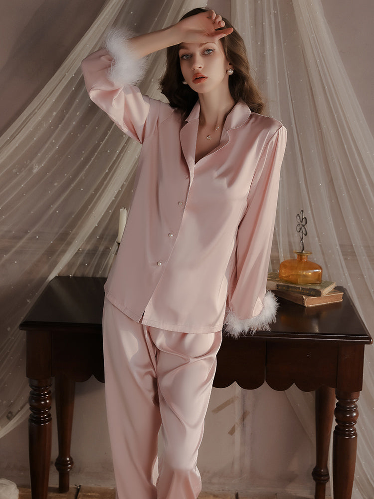 Pink Feather Cuff Satin Pajama Set with button details and feather trimmed cuffs, highlighting the luxurious satin fabric and stylish design.