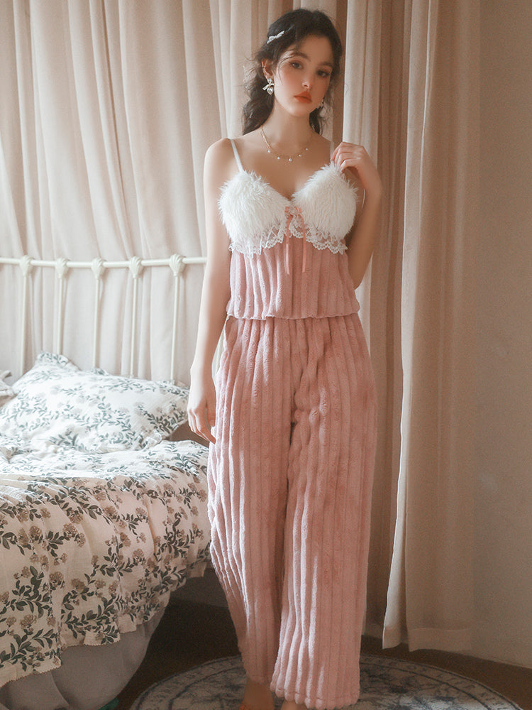 Woman wearing a pink Textured Knit Plush Pink Pajama Set in a bedroom setting.