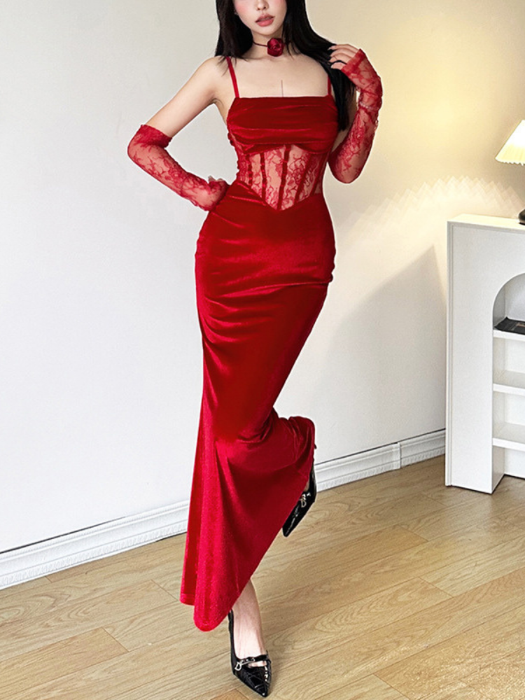 Full length side pose of a model in a red lace corset maxi dress, showcasing the fitted design, sheer lace details, and soft flowing fabric.