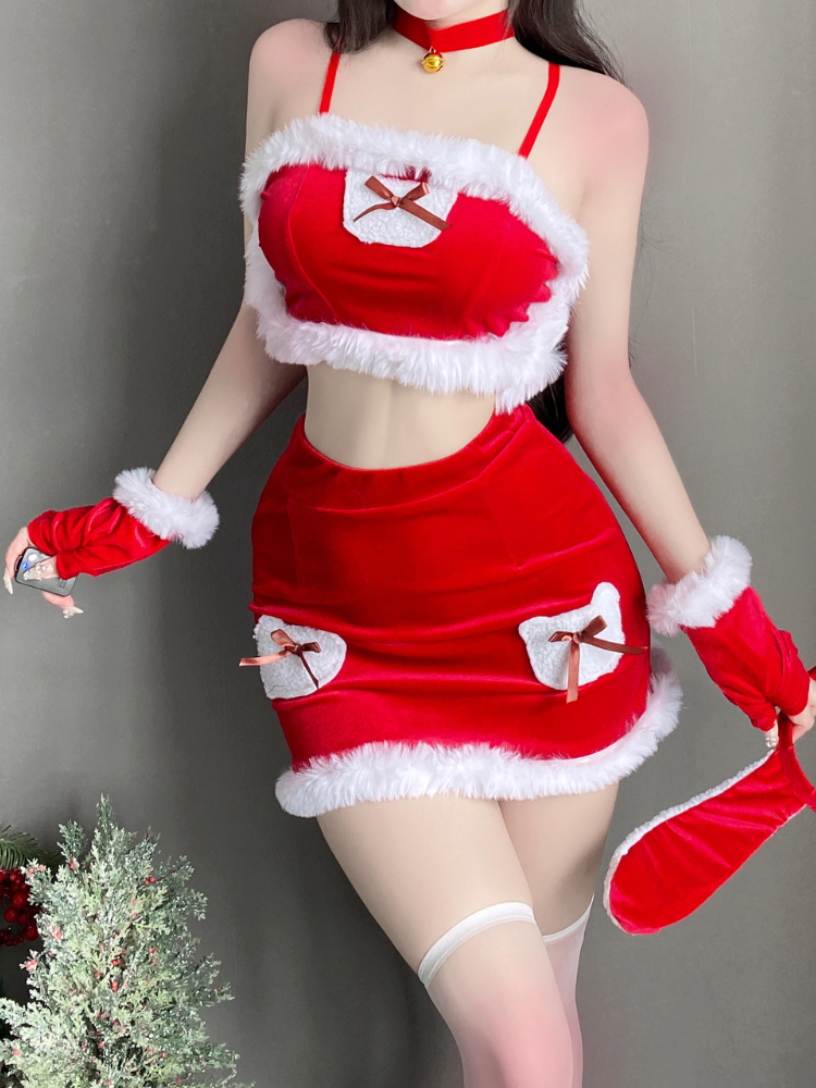 Close up of a furry trimmed cropped top and mini skirt with bow details, part of a festive bunny costume set 