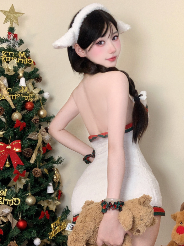 Back view of sexy fluffy festive teddy dress with bow accent, plush texture, and holiday ruffle trim