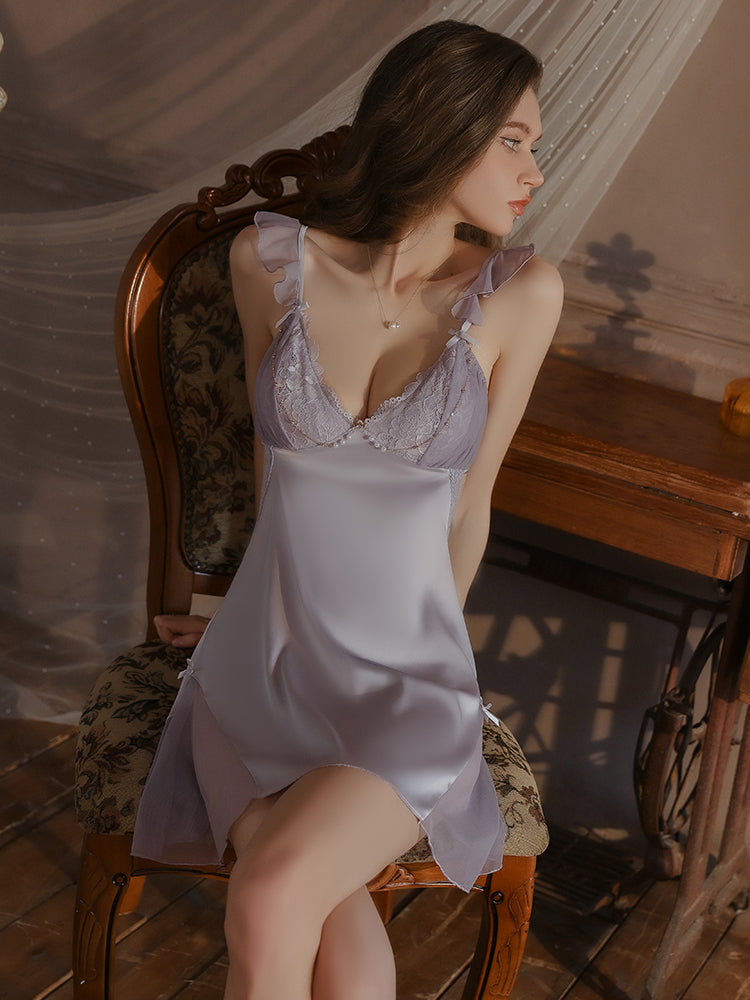 Lavender satin slip dress paired with a matching robe, showcasing its seamless design and elegant lace touches on the hem and sides.