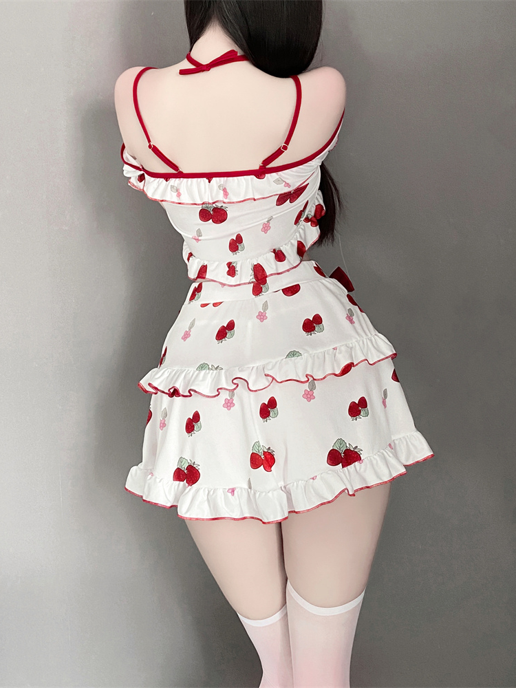 Back view of the strawberry-print off-shoulder crop top and ruffle skirt set, displayed on a mannequin, front and back view.