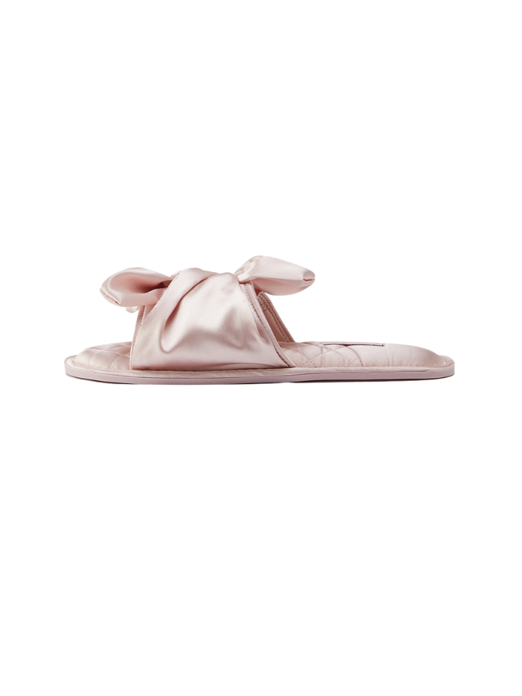 Pink satin bow quilted slippers bottom view non slip rubber outsole