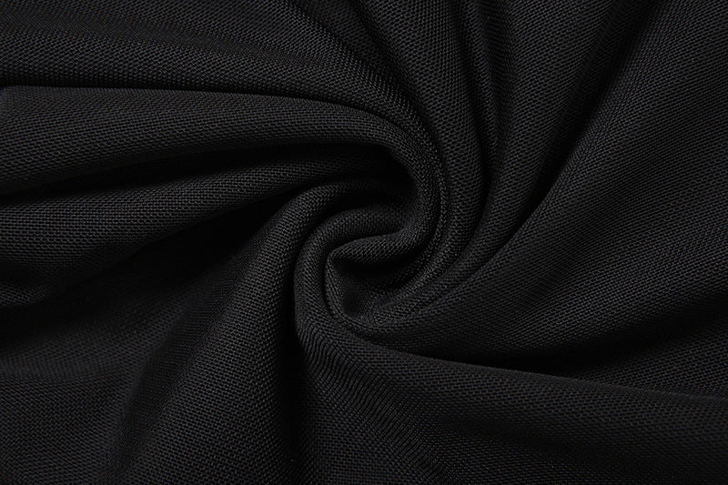 Close-up of black fabric with folds