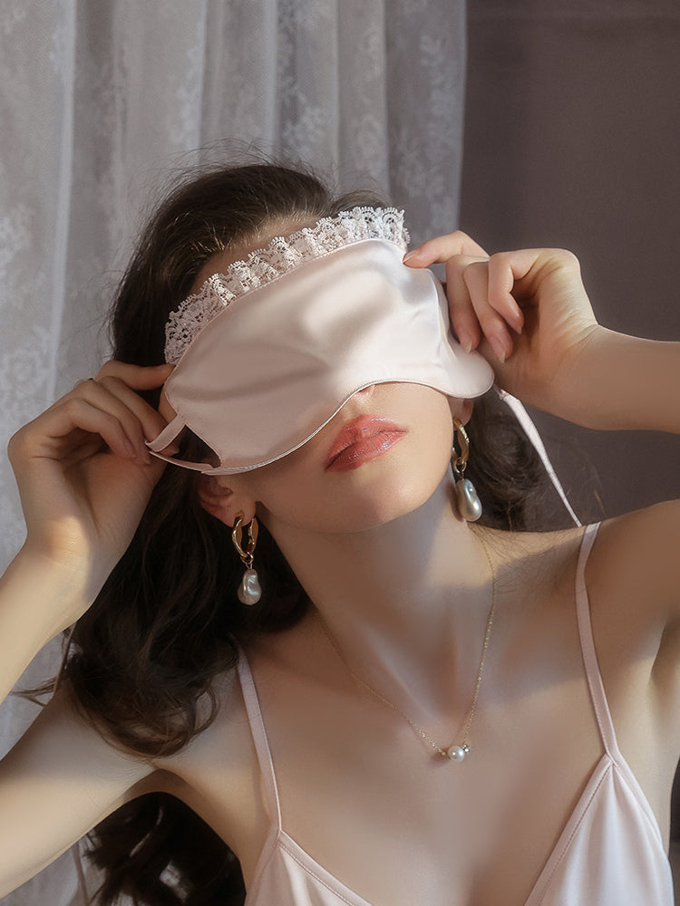 Woman wearing a pink Lace Trim Satin Sleep Mask Blindfold