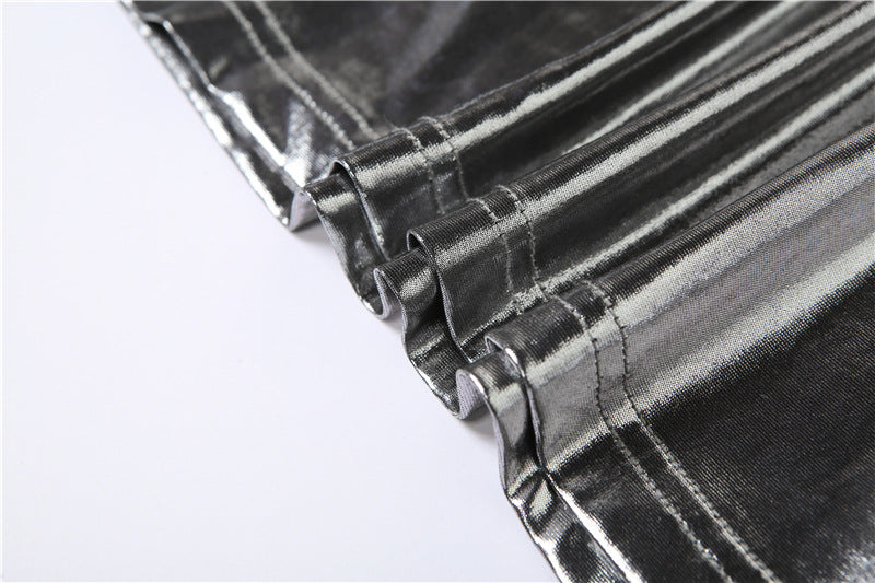 Metallic silver fabric with reflective properties on a white background