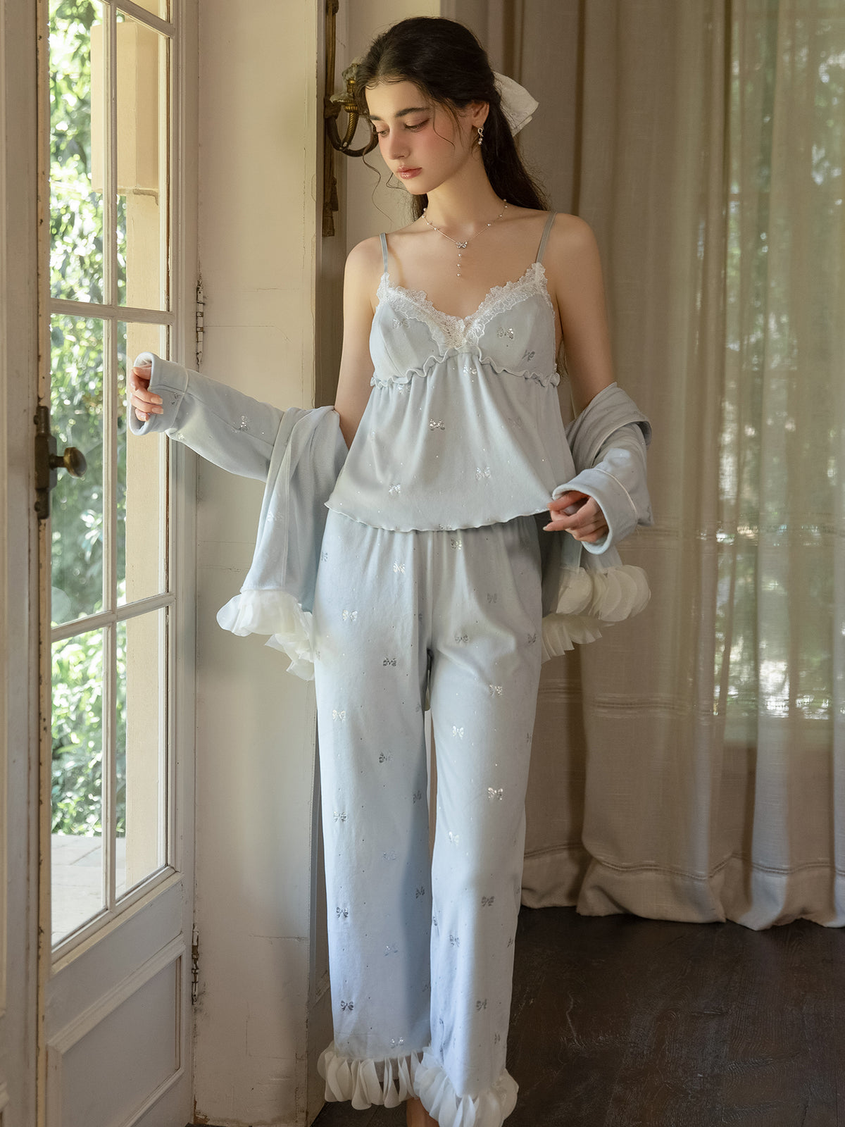 Light Blue bow print sleep jacket worn open over camisole and pants