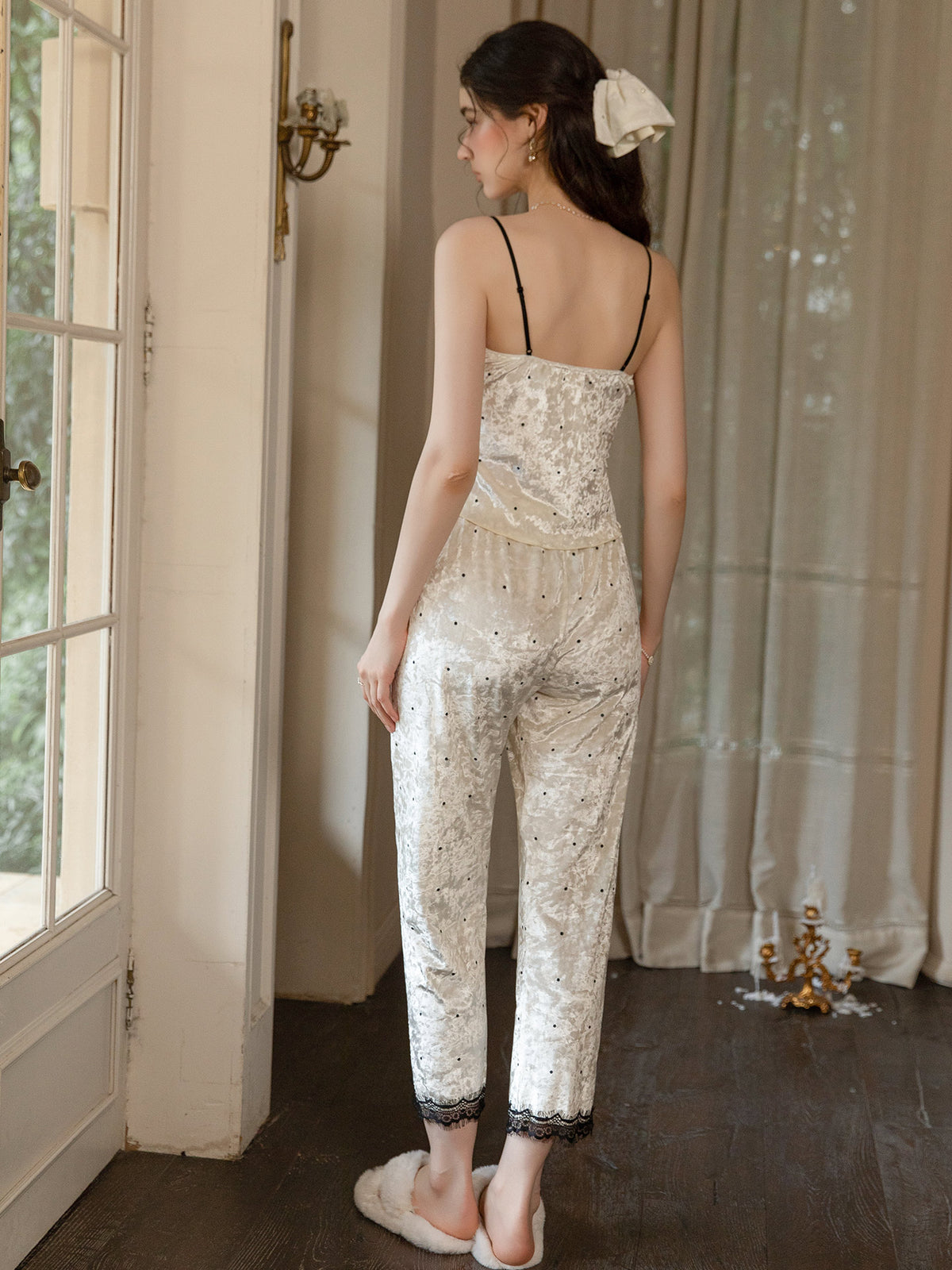 Ivory polka dot camisole and pajama pants rear view