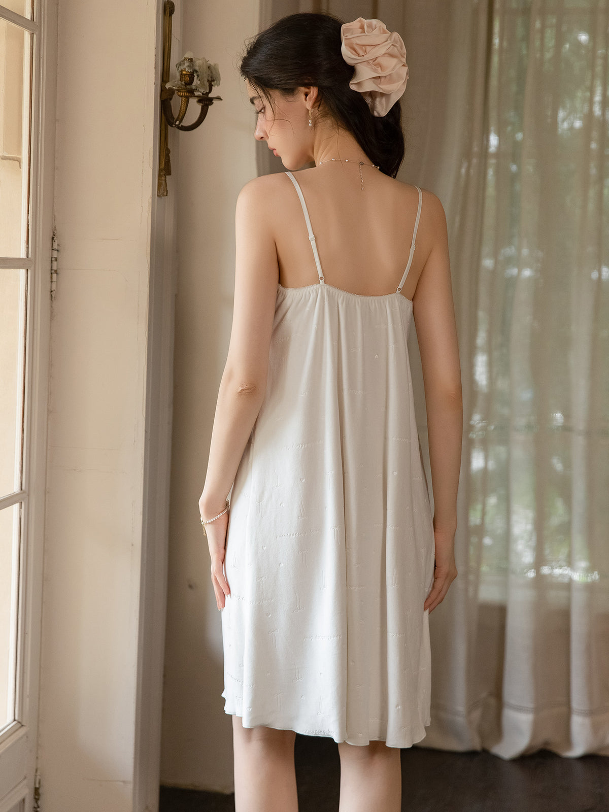 Ivory empire seam nightdress rear view showing gathered back