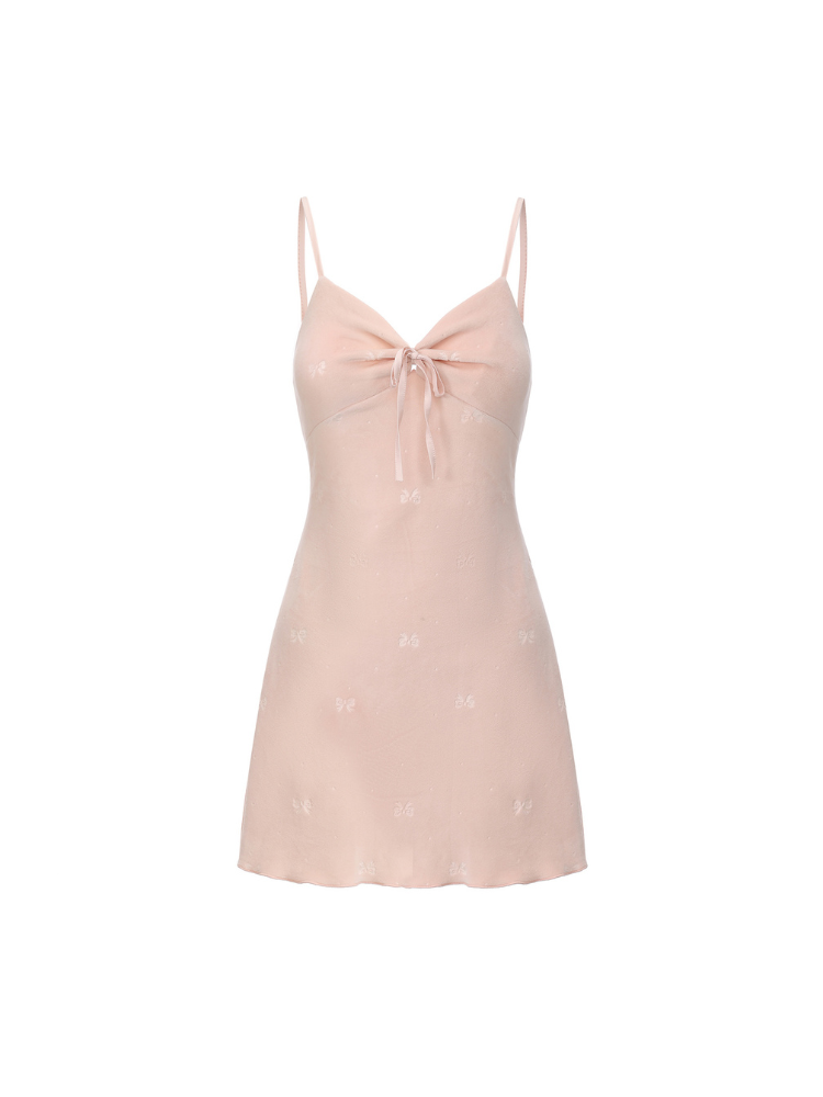Pink bow print ruched V neck mini slip dress flat lay