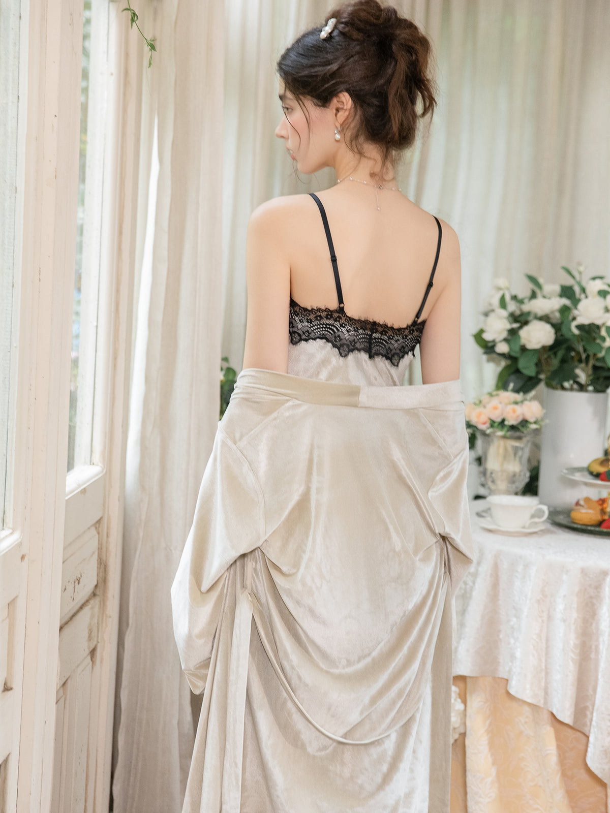 Ivory velvet slip dress rear view showing lace back neckline and draped robe